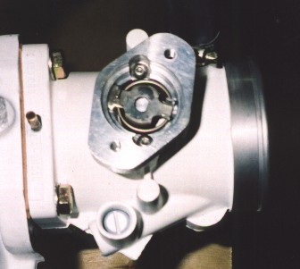 The Honda TPS adapter installed on the Ford XF throttle body