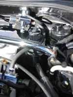 Custom vent to atmosphere catch can